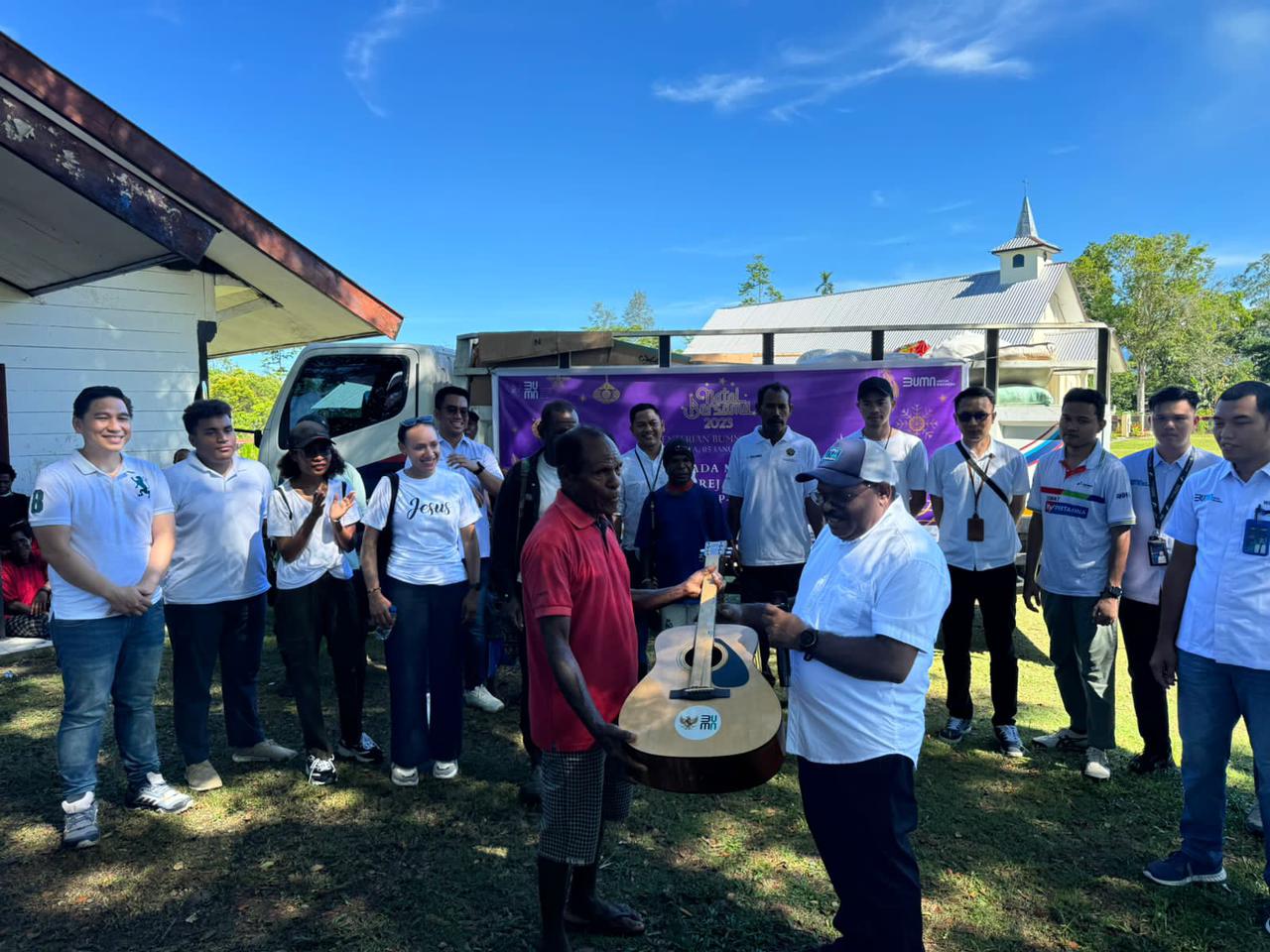 -Penyerahan alat musik berupa gitar untuk gereja 